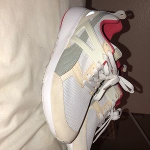 Brand new white pumas